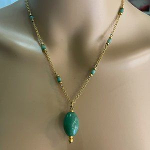 Ralph Lauren Gold drop pendant with jade stone and accent charms